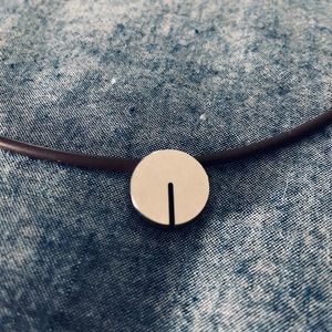 TeNo Stainless Steel Disc Pendant w/ Rubber Chain